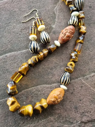 Tiger's eye, glass and carved wood heads necklace earring set