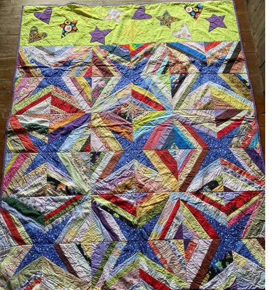 Spikes with purple stars quilt